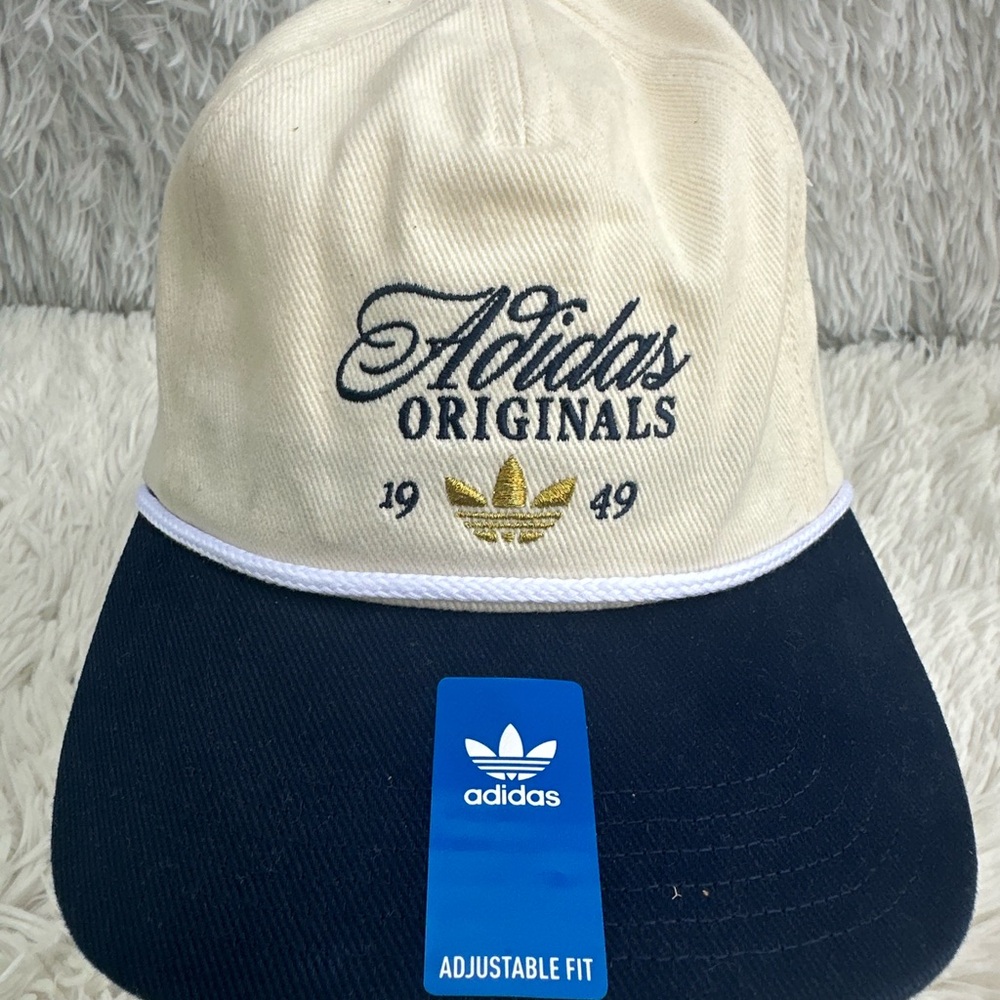 Adidas Original cream color and blue Apparel 1949 logo